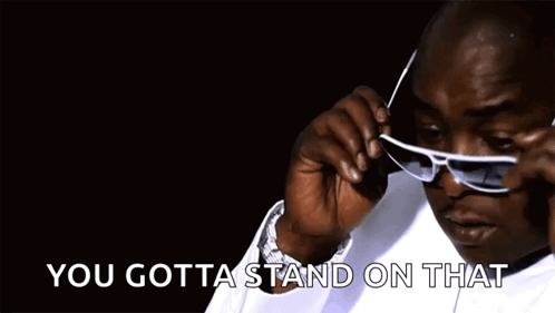 Man Wearing Sunglasses Saying You Gotta Stand On That GIF
