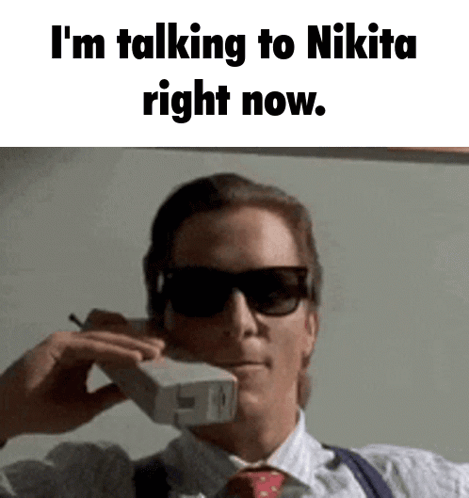 Man Wearing Sunglasses Talking on Phone