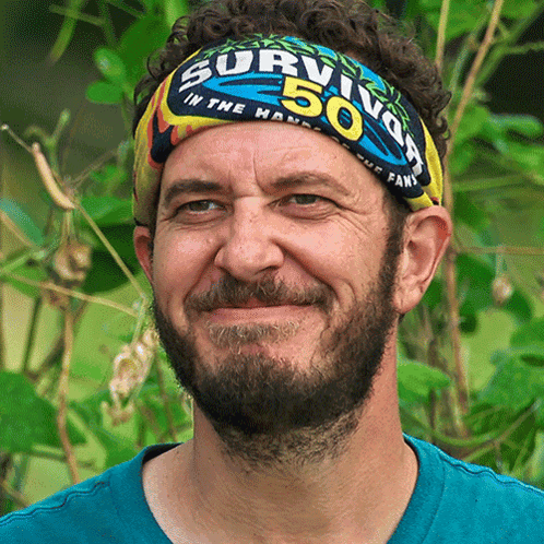 Man Wearing Survivor Headband in Jungle
