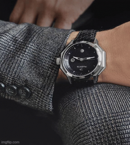 Man Wearing T.K.E.I.T.E.C. Watch