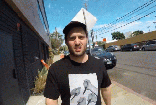 Man Wearing T-Shirt With Knives