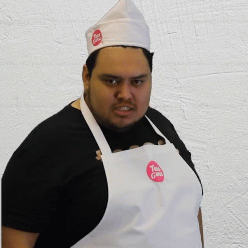 Man Wearing Taco Apron and Hat
