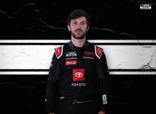 Man Wearing Toyota and Coca-Cola Uniform