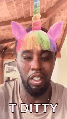 Man Wearing Unicorn Headband Making Funny Face