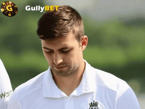 Man Wearing White Gullybet Shirt GIF