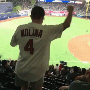 Man Wearing White Jersey Number 4