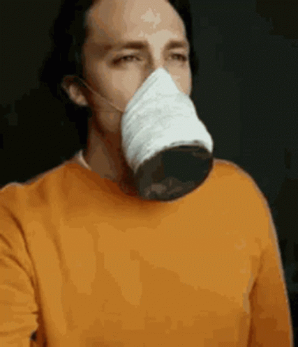 Man Wearing White Long Gas Mask GIF