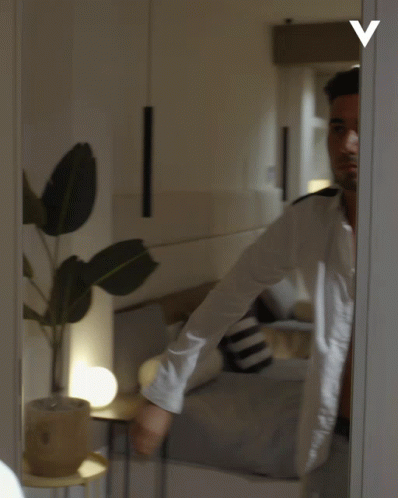 Man Wearing White Polo Getting Ready GIF