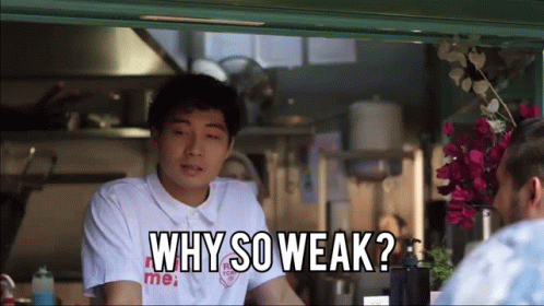 Man Wearing Why So Weak Shirt