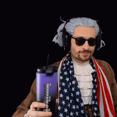 Man Wearing Wig and Sunglasses Holding Purple Container with A