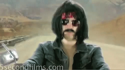 Man Wearing Wig And Sunglasses Riding Motorcycle GIF