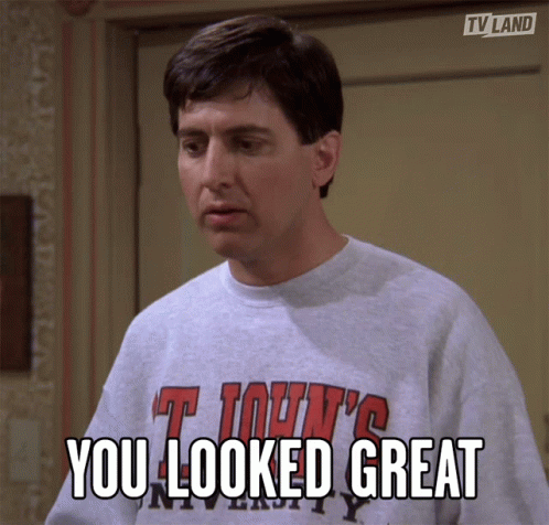 Man Wearing You Looked Great Sweatshirt