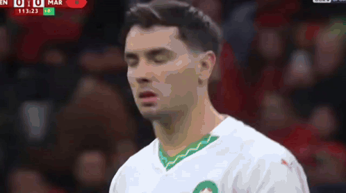 Man White Shirt Green Stripe Downward Eyes Closed GIF