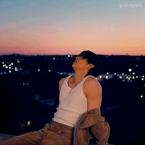 Man White Tank Top Brown Pants Skygazing