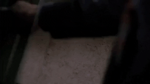 Man Winking On His Own Reflection GIF
