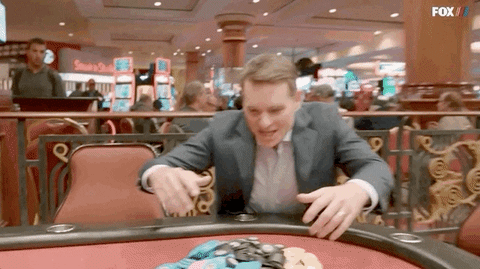 Man Winning Chips During Vegas Vacation GIF