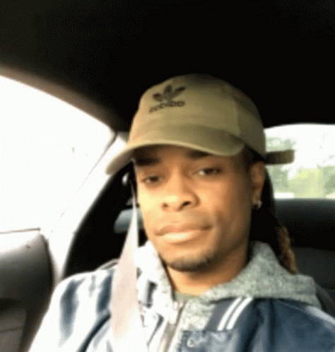 Man With Adidas Hat