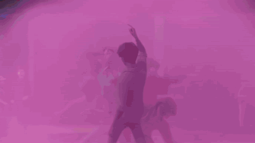 Man With Arms Outstretched Surrounded by Four Women