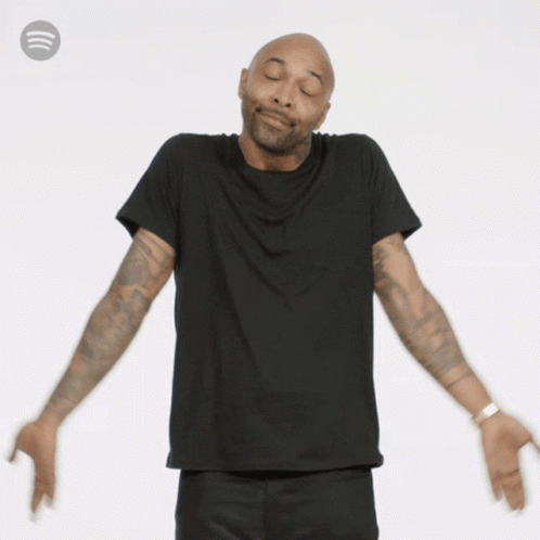 Man with Arms Outstretched Wearing Spotify Logo