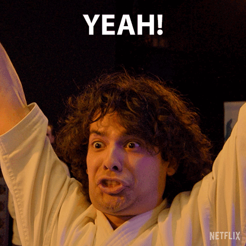 Man with Arms Up and Netflix Logo