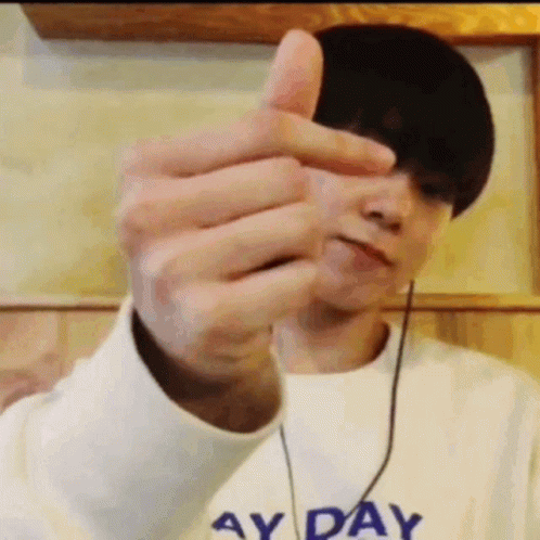 Man With Ay Day Sweater Thumbs Up GIF