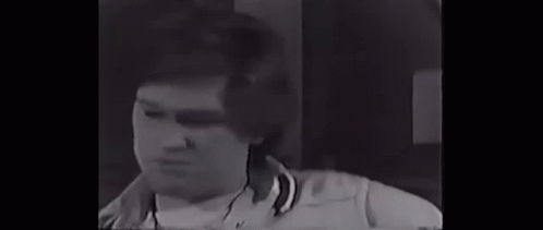 Man With Bandage On Eye Standing Next To Another Man GIF