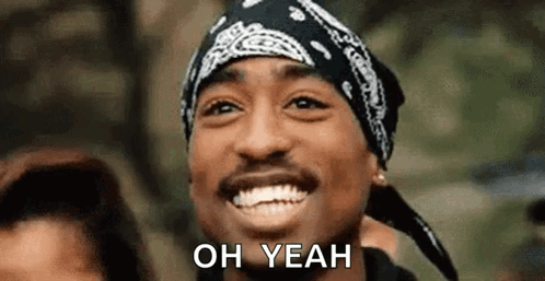 Man With Bandana and Hat Smiling Saying Oh Yeah