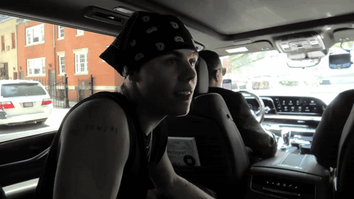 Man With Bandana and I Love You Tattoo in Roman Numerals