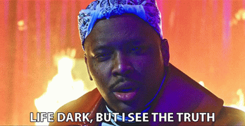 Man with Bandana and Life Dark Words