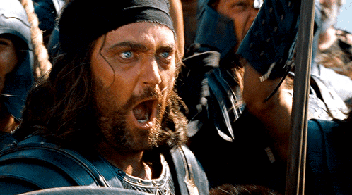 Man With Bandana Holding Sword Screaming GIF