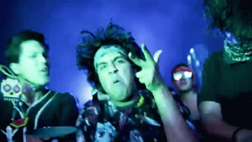 Man with Bandana Making Peace Sign