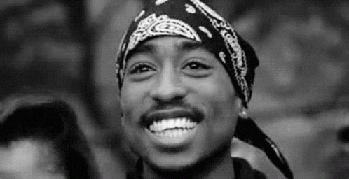 Man With Bandana Smiling In Black And White GIF