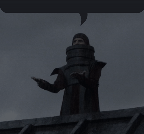 Man With Barrel on Head Standing on Roof With Speech Bubble