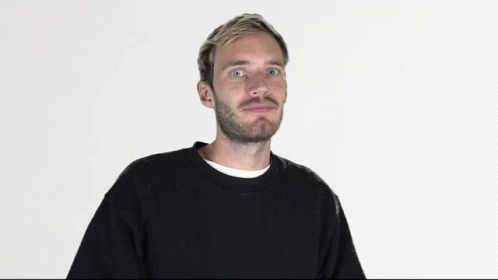 Man With Beard and Blonde Hair in Black Sweater