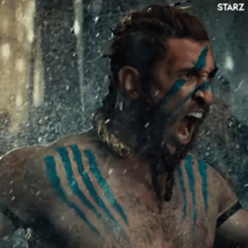 Man With Beard and Blue Paint Screaming in Shower