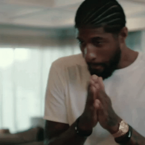 Man with Beard and Braids Praying