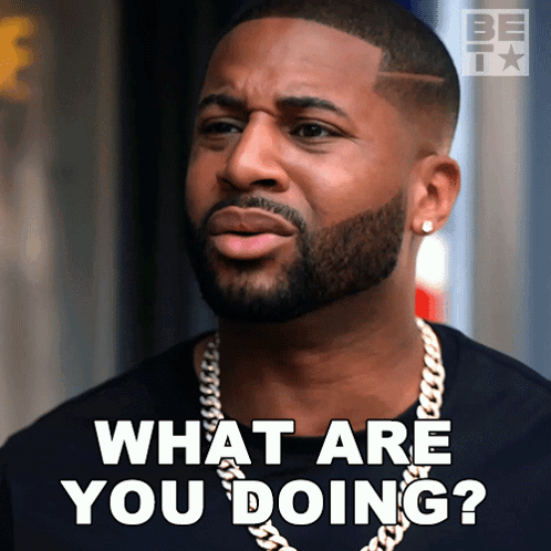 Man with Beard and Chain Says What Are You Doing