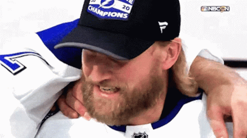 Man with Beard and Champions Hat