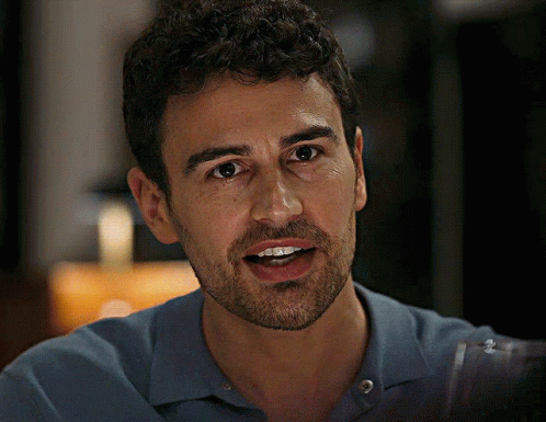 Man with Beard and Curly Hair Smiling