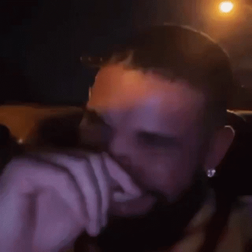 Man With Beard And Earrings Smiling GIF