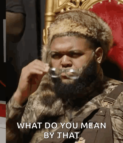 Man with Beard and Fur Hat Saying What