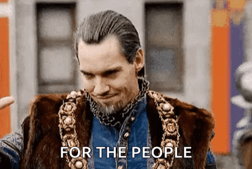 Man With Beard and Fur Vest Saying For the People