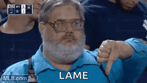 Man with Beard and Glasses Giving Thumbs Down