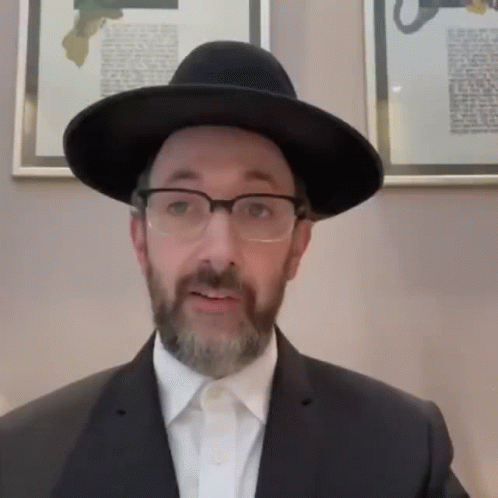 Man with Beard and Glasses in Black Hat