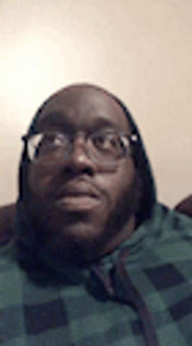 Man with Beard and Glasses in Plaid Shirt and Hoodie