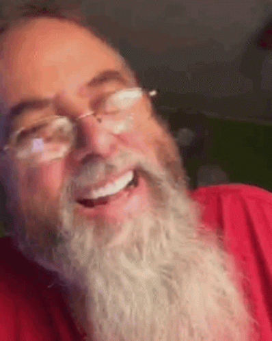 Man With Beard and Glasses Laughing