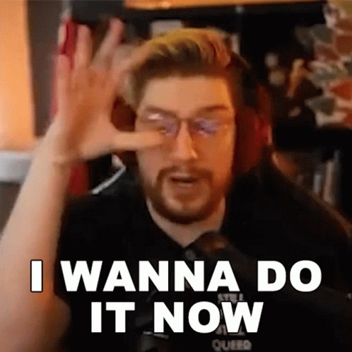 Man With Beard and Glasses Making OK Sign
