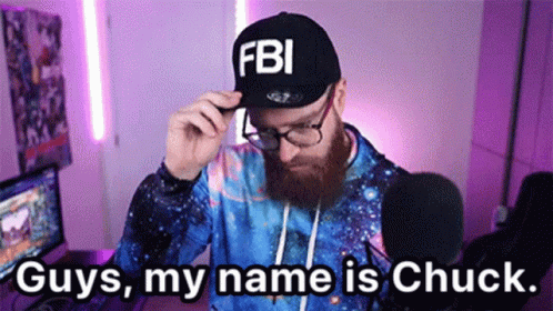 Man With Beard and Glasses Wearing FBI Hat