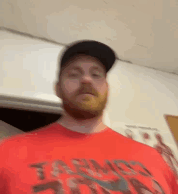 Man With Beard And Hat In Red Shirt And Black Hat GIF