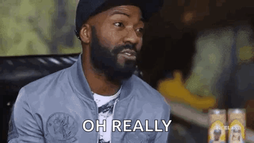 Man with Beard and Hat Saying Oh Really
